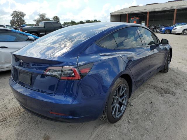 Photo 4 from auction – 2022 TESLA MODEL 3 with VIN 5YJ3E1EA2NF109025