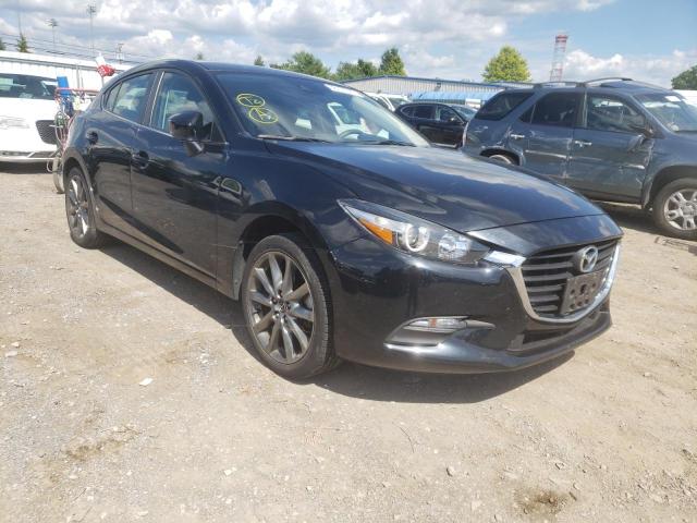MAZDA 3 TOURING 2018 with VIN 3MZBN1L3XJM267700 - Photo from auction