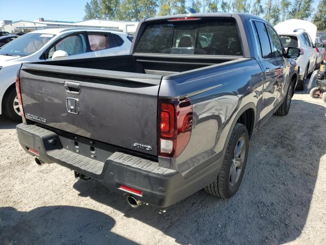 Photo 4 from auction – 2022 HONDA RIDGELINE with VIN 5FPYK3F72NB026165