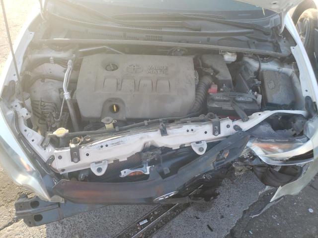 Photo 7 from auction – 2014 TOYOTA COROLLA EC with VIN 5YFBPRHE4EP048283