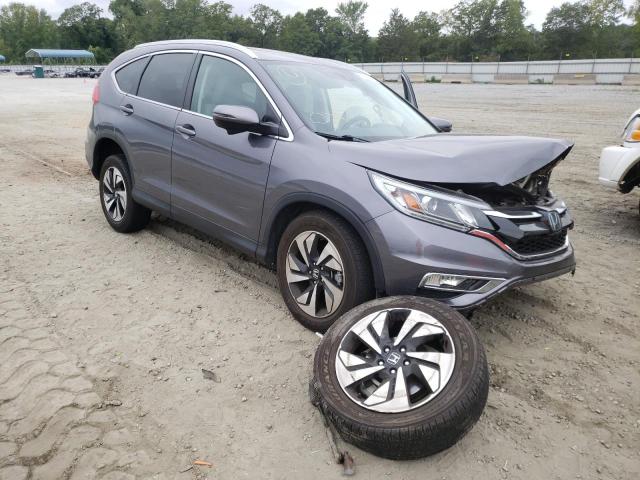 Photo 1 from auction – 2016 HONDA CR-V TOURI with VIN 5J6RM4H95GL102578
