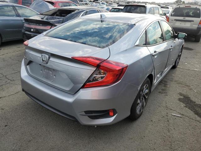Photo 4 from auction – 2017 HONDA CIVIC EX with VIN 19XFC2F70HE213633