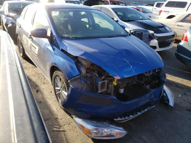 FORD FOCUS SE 2018 with VIN 1FADP3K23JL211275 - Photo from auction