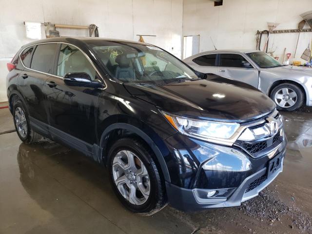 HONDA CR-V EXL 2018 with VIN 7FARW2H89JE071054 - Photo from auction