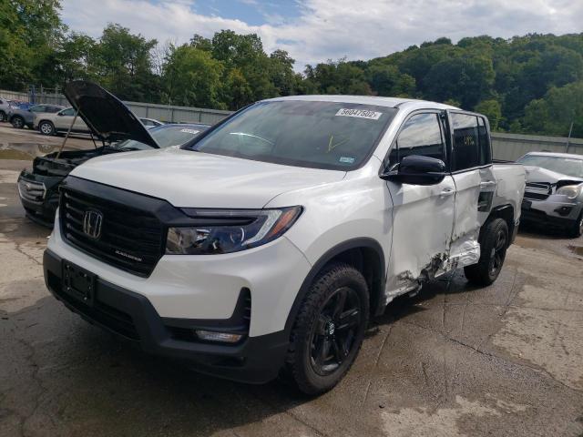 Photo 2 from auction – 2022 HONDA RIDGELINE with VIN 5FPYK3F85NB025228