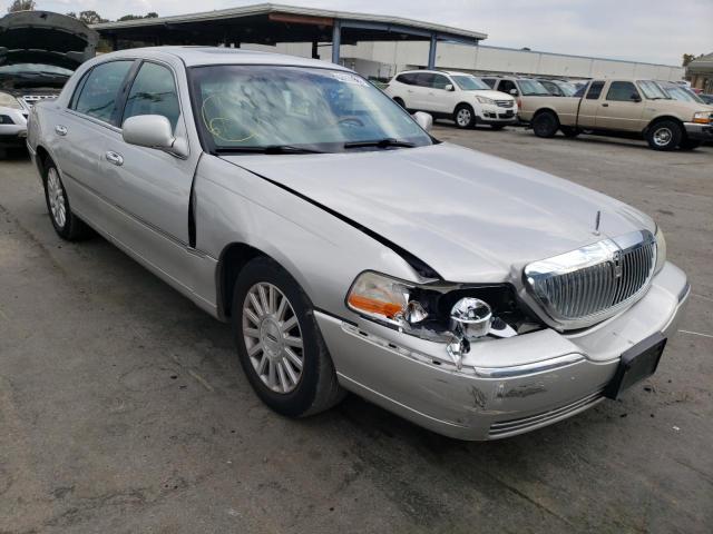 LINCOLN TOWN CAR U 2004 with VIN 1LNHM83WX4Y647501 - Photo from auction