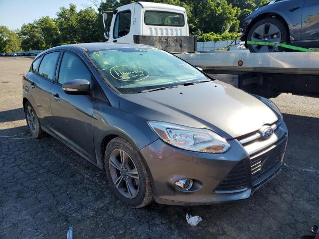 FORD FOCUS SE 2014 with VIN 1FADP3K29EL418422 - Photo from auction