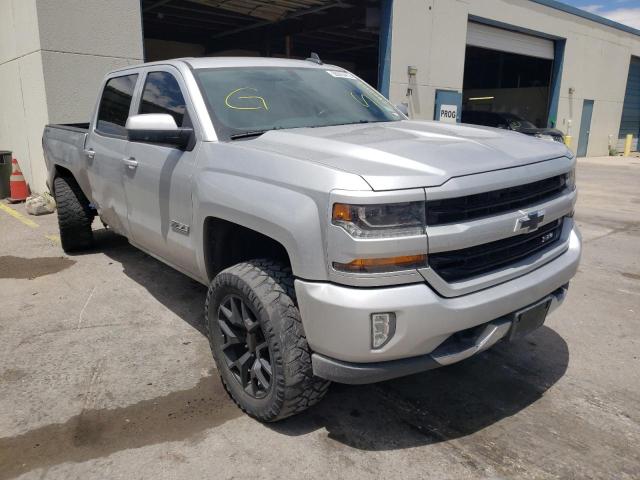 CHEVROLET SILVERADO 2018 with VIN 3GCUKRECXJG283104 - Photo from auction