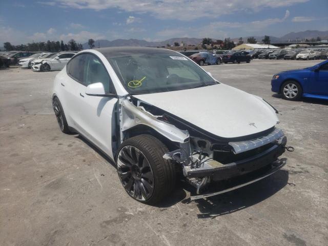 TESLA MODEL Y 2021 with VIN 5YJYGDEF6MF211696 - Photo from auction