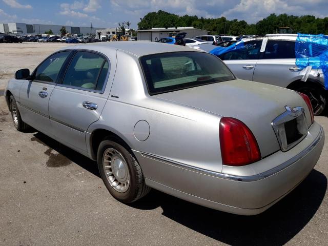 Photo 3 from auction – 2000 LINCOLN TOWN CAR E with VIN 1LNHM81W5YY828028