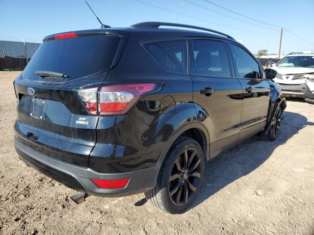 Photo 4 from auction – 2018 FORD ESCAPE SE with VIN 1FMCU9GD6JUA36117