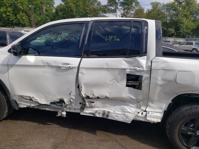 Photo 9 from auction – 2022 HONDA RIDGELINE with VIN 5FPYK3F85NB025228