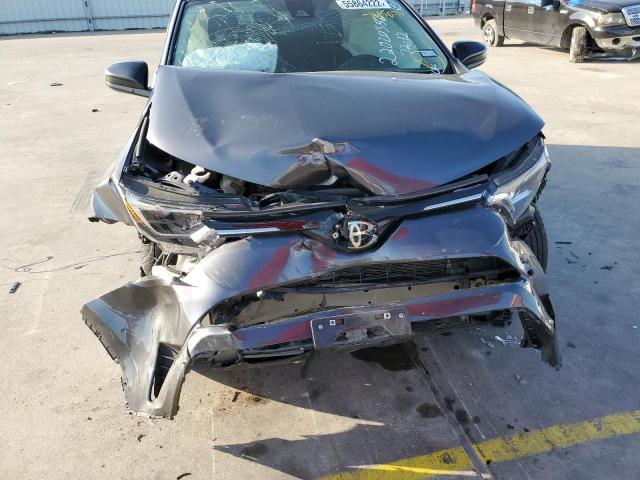 Photo 9 from auction – 2018 TOYOTA RAV4 LE with VIN JTMZFREV4JJ745070