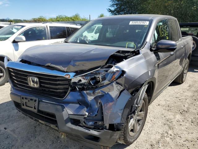 Photo 2 from auction – 2022 HONDA RIDGELINE with VIN 5FPYK3F72NB026165