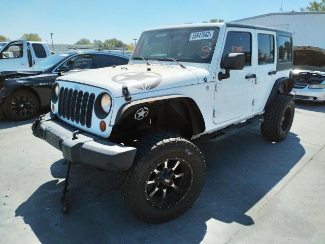 Photo 2 from auction – 2011 JEEP WRANGLER U with VIN 1J4BA3H13BL598200