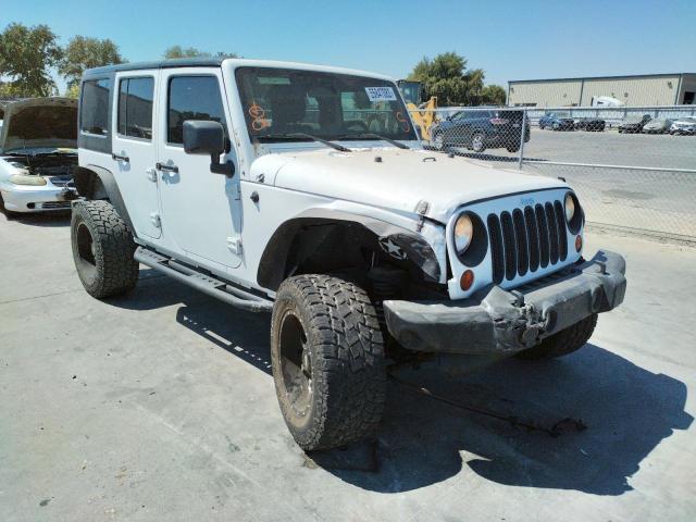JEEP WRANGLER U 2011 with VIN 1J4BA3H13BL598200 - Photo from auction