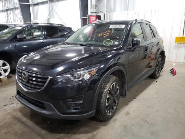 Photo 2 from auction – 2016 MAZDA CX-5 GT with VIN JM3KE4DY8G0610666