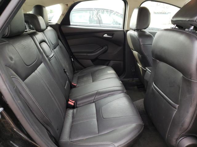 Foto 6 de la subasta – 2013 FORD FOCUS SE con VIN 1FADP3K26DL162352
