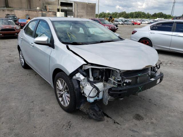 TOYOTA COROLLA L 2015 with VIN 2T1BURHE2FC464603 - Photo from auction