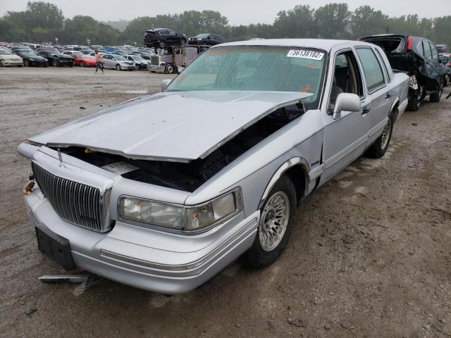 Photo 2 from auction – 1997 LINCOLN TOWN CAR E with VIN 1LNLM81W0VY754670