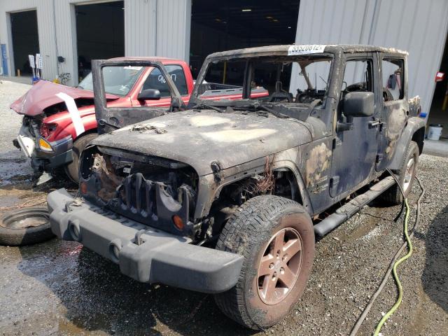 Photo 2 from auction – 2013 JEEP WRANGLER U with VIN 1C4BJWDG9DL635920