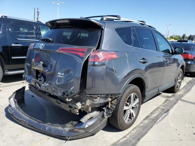 Photo 4 from auction – 2016 TOYOTA RAV4 XLE with VIN 2T3RFREV0GW466144