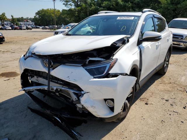 Photo 2 from auction – 2017 TOYOTA RAV4 XLE with VIN 2T3RFREV9HW628936