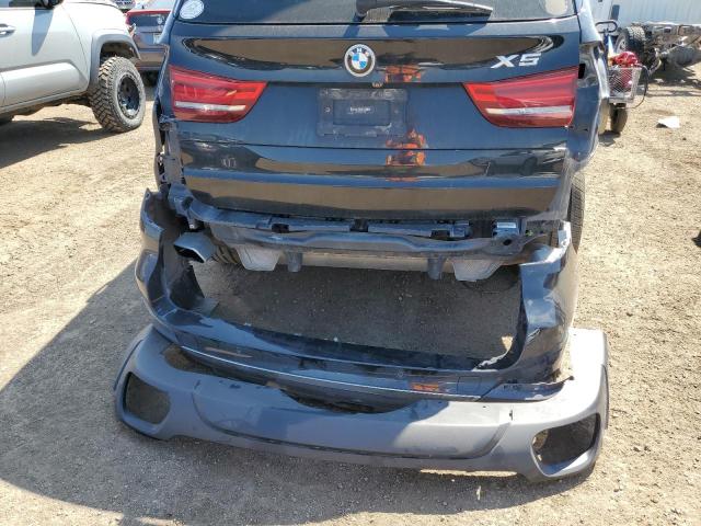 Photo 9 from auction – 2014 BMW X5 XDRIVE5 with VIN 5UXKR6C54E0J71560
