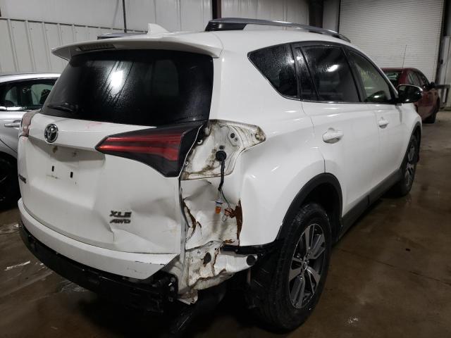 Photo 4 from auction – 2017 TOYOTA RAV4 XLE with VIN JTMRFREV9HJ701754