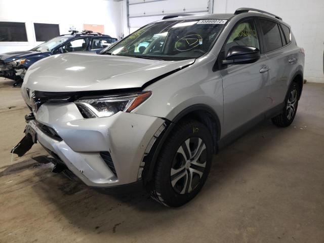 Photo 2 from auction – 2018 TOYOTA RAV4 LE with VIN JTMBFREV4JJ208376