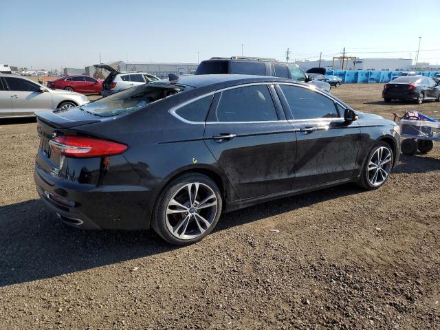 Photo 4 from auction – 2019 FORD FUSION TIT with VIN 3FA6P0D91KR138976