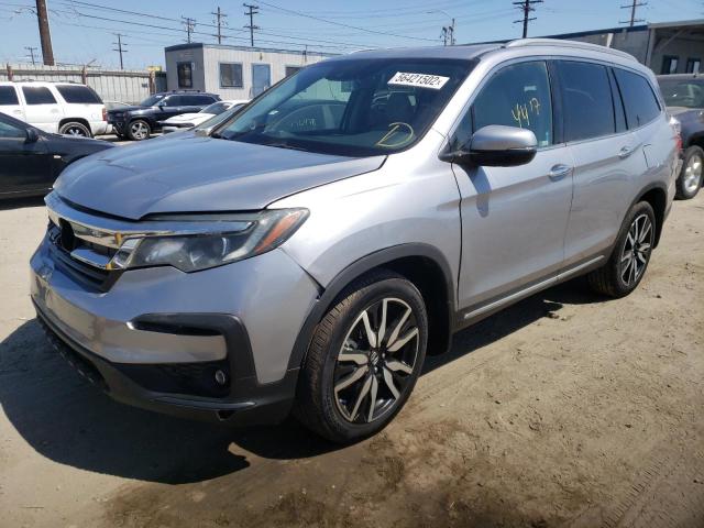 Photo 2 from auction – 2021 HONDA PILOT TOUR with VIN 5FNYF5H92MB024518