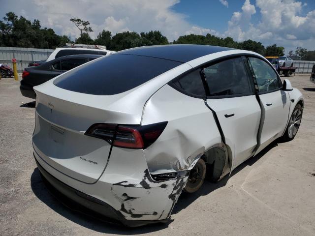 Photo 4 from auction – 2021 TESLA MODEL Y with VIN 5YJYGDEEXMF069666