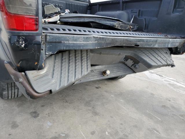 Photo 9 from auction – 2002 NISSAN FRONTIER K with VIN 1N6ED26T12C359976