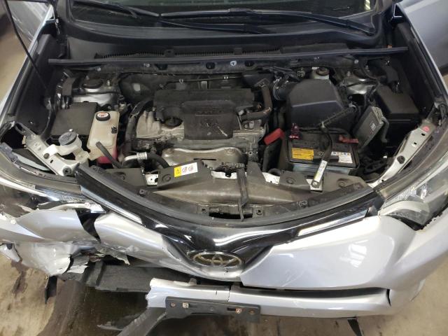 Photo 7 from auction – 2018 TOYOTA RAV4 LE with VIN JTMBFREV4JJ208376