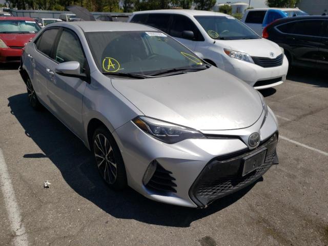 TOYOTA COROLLA L 2018 with VIN 5YFBURHE6JP799470 - Photo from auction