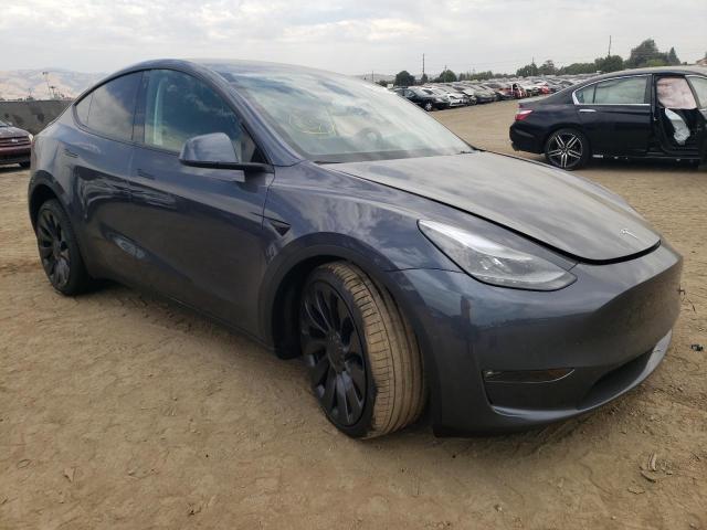 TESLA MODEL Y 2022 with VIN 7SAYGDEF4NF494801 - Photo from auction