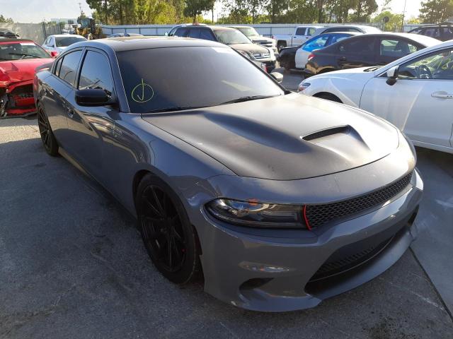 DODGE CHARGER R/ 2018 with VIN 2C3CDXGJ8JH129680 - Photo from auction