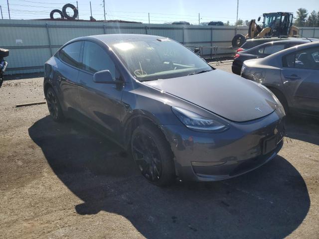 TESLA MODEL Y 2022 with VIN 7SAYGDEE2NF386359 - Photo from auction