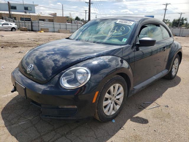 Photo 2 from auction – 2014 VOLKSWAGEN BEETLE with VIN 3VWFP7ATXEM601571
