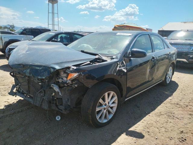 Photo 2 from auction – 2012 TOYOTA CAMRY HYBR with VIN 4T1BD1FK7CU023280