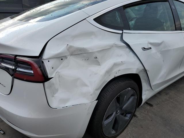 Photo 9 from auction – 2019 TESLA MODEL 3 with VIN 5YJ3E1EB2KF469223
