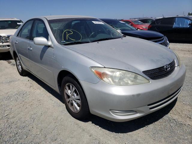 TOYOTA CAMRY LE 2004 with VIN 4T1BF32K34U067340 - Photo from auction
