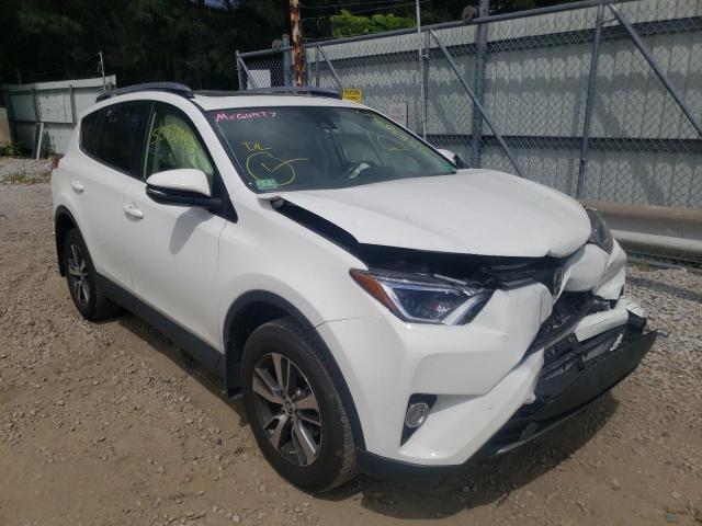 TOYOTA RAV4 XLE 2017 with VIN JTMRFREV7HJ171493 - Photo from auction