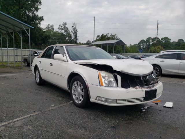 CADILLAC DTS 2011 with VIN 1G6KA5E63BU119546 - Photo from auction