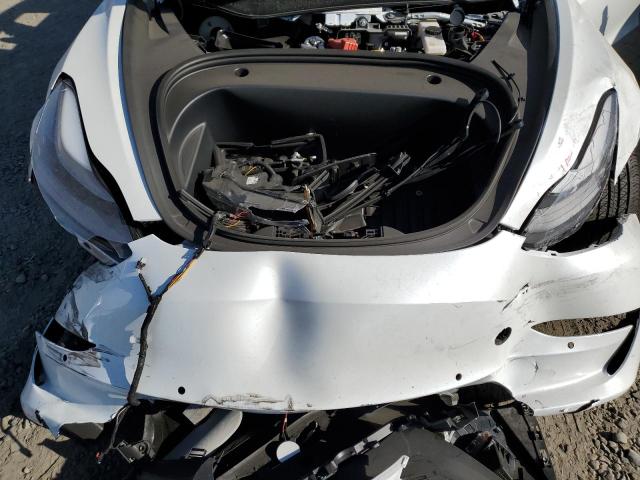 Photo 7 from auction – 2022 TESLA MODEL 3 with VIN 5YJ3E1EB5NF144618