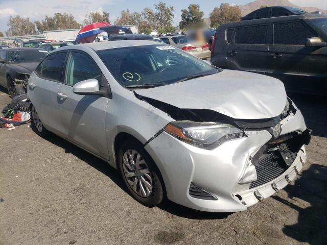 TOYOTA COROLLA L 2018 with VIN 2T1BURHE0JC038000 - Photo from auction
