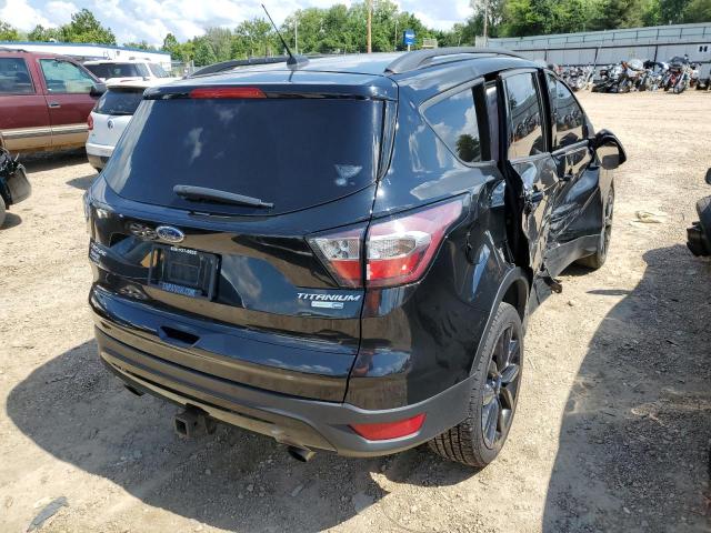 Photo 4 from auction – 2017 FORD ESCAPE TIT with VIN 1FMCU9J98HUC78924