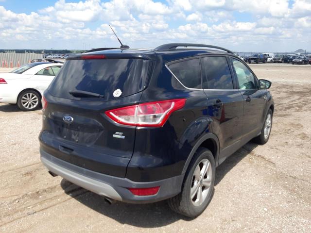 Photo 4 from auction – 2016 FORD ESCAPE SE with VIN 1FMCU9GX5GUB71690