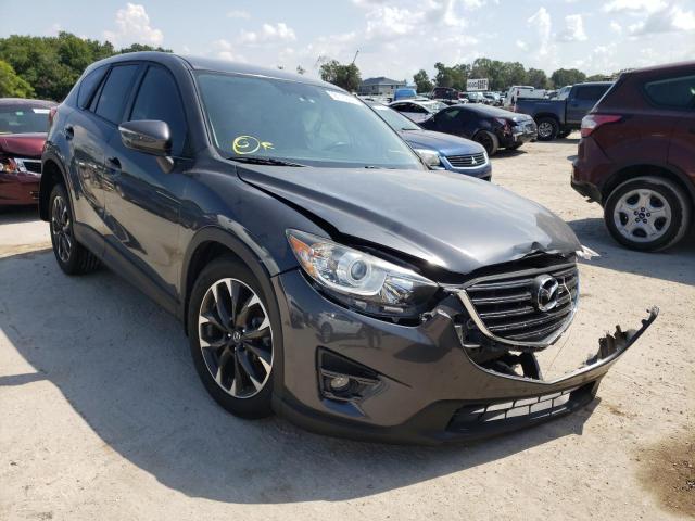 MAZDA CX-5 GT 2016 with VIN JM3KE2DY8G0768879 - Photo from auction
